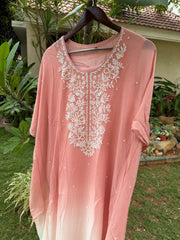 This Draped ensemble paired  Kaftan Set