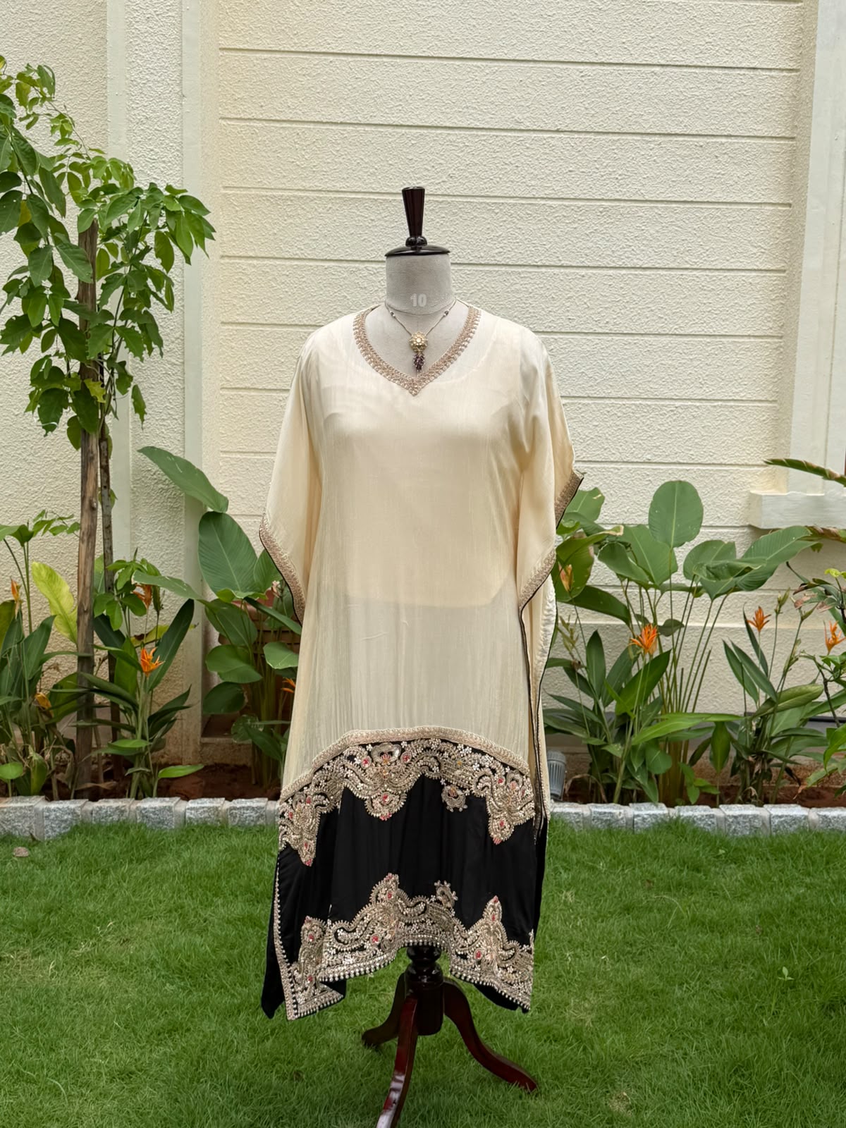A fluid ivory kaftan